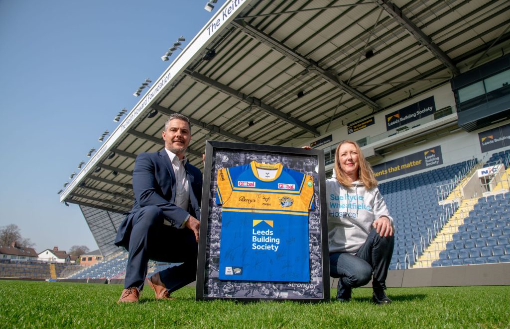G&H Maintenance donates signed Leeds Rhinos match shirt to help charity raise funds
